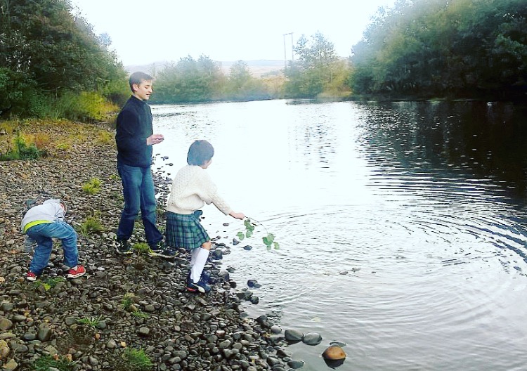 Cameron and some of the Zielsdorf children on the banks of the Spey (with permission)